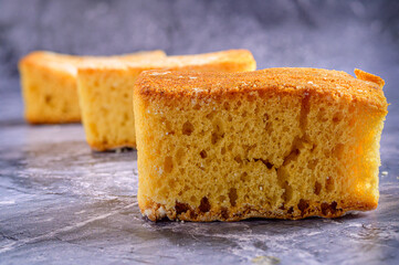 Three Sponge Cake Slices on Marble Surface