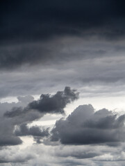 Obraz premium Low gray rain clouds thicken in the sky. The sky before the rain