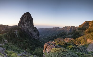 Fototapeta premium Roque de Agando rock tower at sunrise, Monumento Natural de los Roques, La Gomera, Canary Islands, Spain, Europe