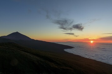 Volcano Pico del Teide at sunset, over clouds, Teide National Park, Canary Islands, Tenerife, Spain, Europe