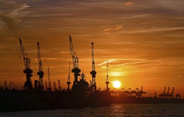 Sunset, silhouette, Hamburg harbour with harbour cranes, Hamburg, Germany, Europe