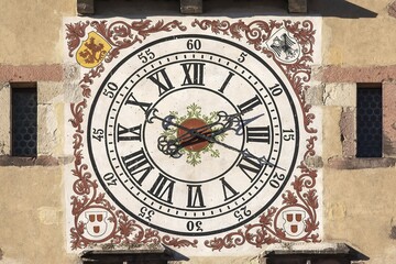 Historic tower clock at the Metzgerturm, Ribeauvillé, Alsace, France, Europe