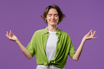 Tranquil Woman relaxing, meditating, refuses stress. Lady breathes deeply, calms down violet studio...