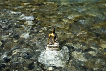 Bhumispara mudra, Buddha Gautama at the moment of enlightenment, statue in a mountain stream, Oytal...
