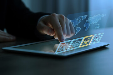 Real estate agent using tablet computer at table, closeup. Illustrations over device