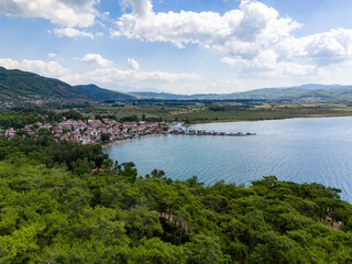 Fototapeta premium Akyaka District in Ula, Mugla, Turkey. Aerial view of Akyaka. Akyaka is situated at the Gulf of Gokova. Beautiful Beach and Coast View.