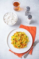 Cabbage and carrots thoran in a bowl