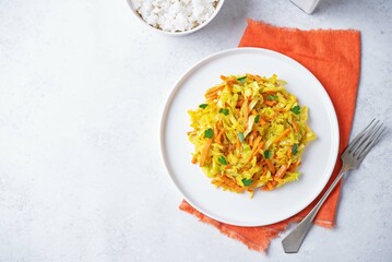Cabbage and carrots thoran in a bowl