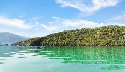 Calm Blue Lagoon on a Clear Summer Day – A Tropical Paradise for Relaxation