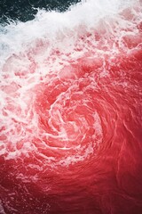 Fototapeta premium red swirling ocean waves