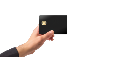 Hand holding a black credit card with a chip isolated on black background.