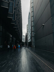 Alleyway towards The Shard between modern buildings in London, UK
