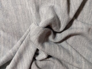 texture background. Soft knitted fabric in grey