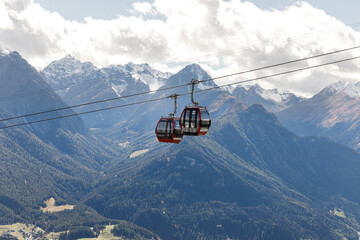 cable car and tourist cabin in the Alps. Snowy mountain peaks and panorama. Swiss Alps