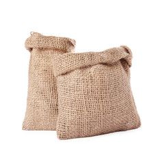 Two natural burlap sacks isolated on white