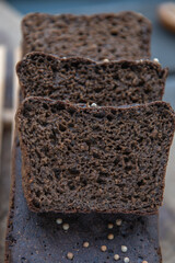 Sliced rye homemade bread. rye sourdough bread on a wooden cutting board.