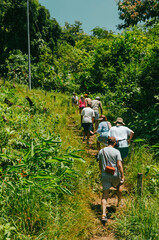 Tourists walking along trails in Sapzurro, Colombia.