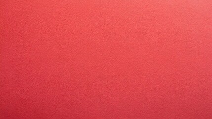 Fototapeta premium Sheet of red paper texture background, showcasing a smooth, vibrant red surface with subtle tonal variations