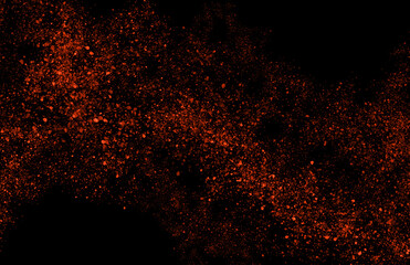 orange particles flowing on black background
