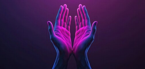 Obraz premium Glowing hands in purple light on dark background