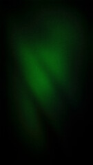 A dark abstract gradient with rich green hues and a grainy texture. Perfect for vertical 4K wallpapers, banners, and minimalistic backdrops in digital designs