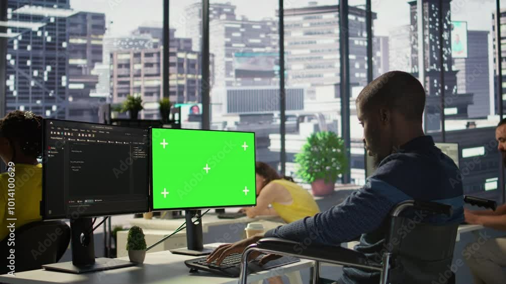 Poster person with disability testing and deploying programs and systems on green screen pc. software techn
