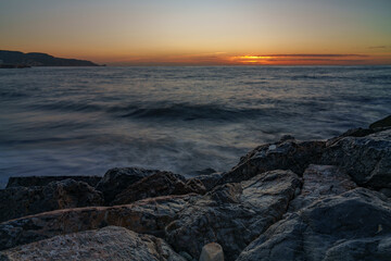 An atmospheric view of the sea, where the waves are washed away