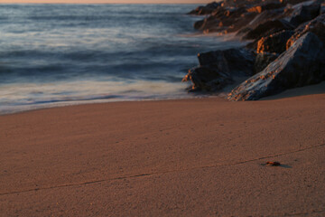 An atmospheric view of the sea, where the waves are washed away