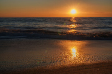 An atmospheric view of the sea, where the waves are washed away