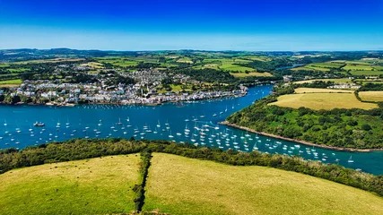 Aerial View of a Coastal Town with Sailboats in Cornwall, UK © iSky Media