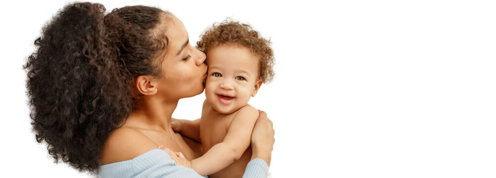 Love of a mother and baby in her arms on white background. Family, child and mom in the house. Lifestyle