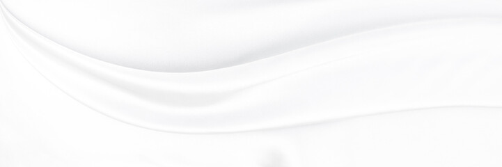 White gray satin texture that is white silver fabric silk panorama background with beautiful soft blur pattern natural.
