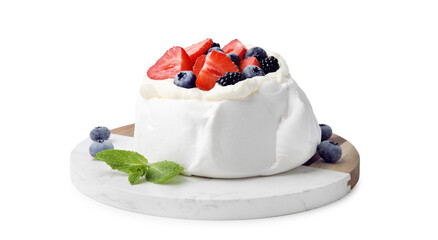 Pavlova cake (meringue dessert) with whipped cream, fresh berries and mint isolated on white