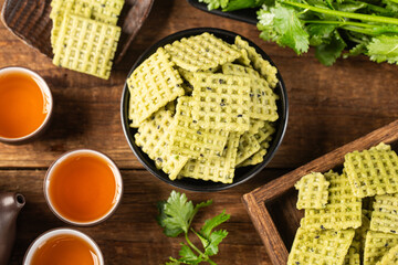 a kind of delicious snack made from rice,Cilantro flavored rice crusts, 