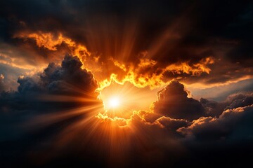 Sun breaking through dark clouds, casting radiant beams of light across the sky. Nature's inspiration concept
