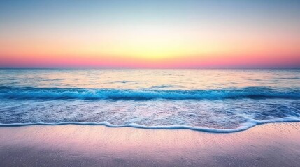 Fototapeta premium A tranquil beach horizon at sunset with gentle waves and a clear sky transitioning into evening light.