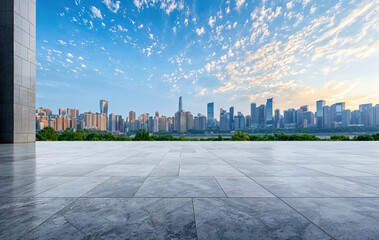 Plakat Empty marble floor overlooking modern city skyline with lush green trees and blue sky