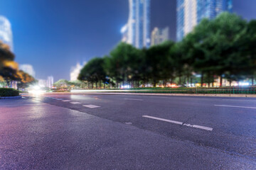 the light trails on the modern building background in shanghai china.