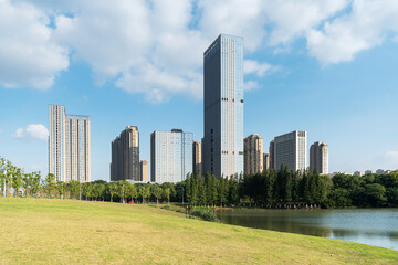 Obraz premium city park with modern building background in shanghai