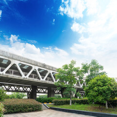 Fototapeta premium Pedestrian bridge against blue sky