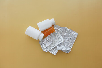 Assorted Empty Pharmaceutical Containers and Blister Packs for Medication Storage