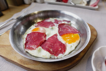 Savory eggs and tender beef create a hearty meal that satisfies hunger and warms the soul