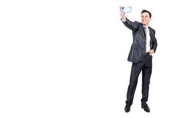 Positive businessman taking selfie on white background