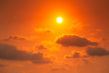 The strong sunlight sky with clouds during very hot day in summer