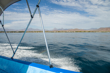 Fishing and tourist boats in the port of Loreto during the summer vacation season, Baja California...