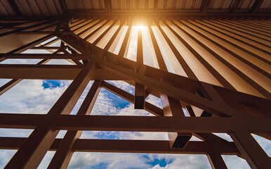 A structure featuring wooden slats on construction site contributing to its architectural style