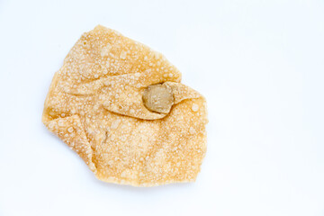 deep fried wontons or fried pangsit in Indonesian, on white background