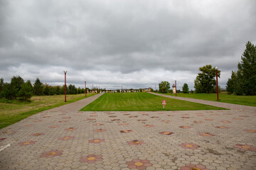 sidewalk in the Bird Harbor Nature Park Omsk  in summer