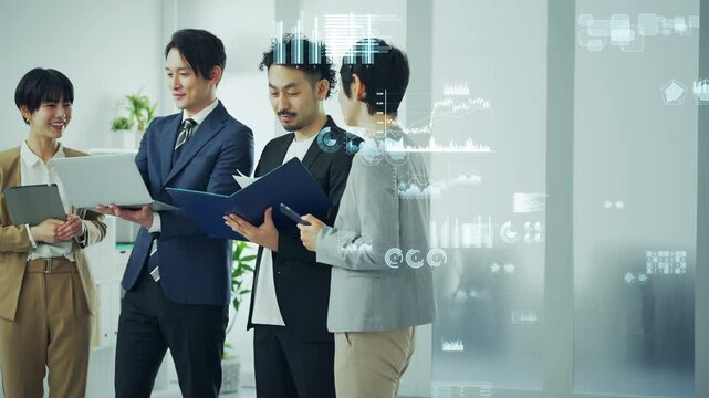 オフィスでミーティングするビジネスパーソンのグループと統計データ