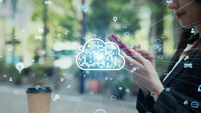 Woman using smartphone in the city and cloud computing concept